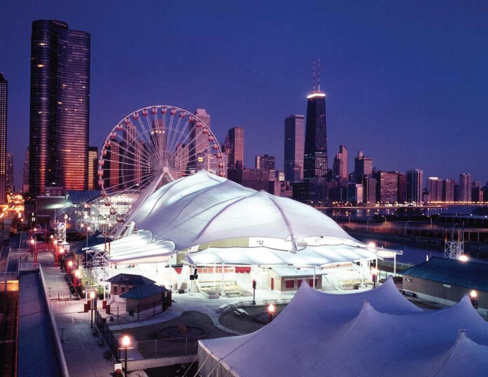 Fabric originally designed for Apollo spacesuits crowns buildings such as the Pepsi Skyline Stage on Navy Pier in Chicago (shown here), the University of La Verne's "Super Tents" in California and Palm Springs International Airport in California. <cite>NASA</cite>